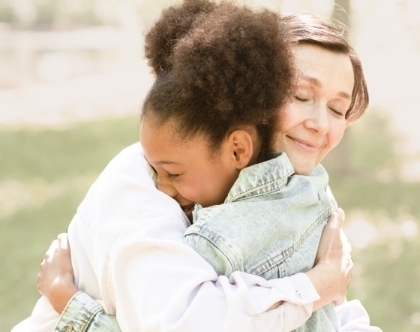 lady hugging a child