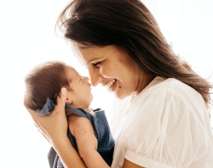 woman holding baby